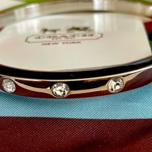 Never worn Coach bangle. Very shiny and sparkles!